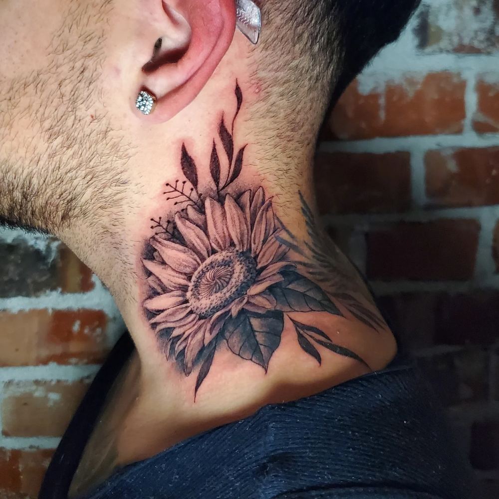 Sunflower tattoo by Adrian Castro