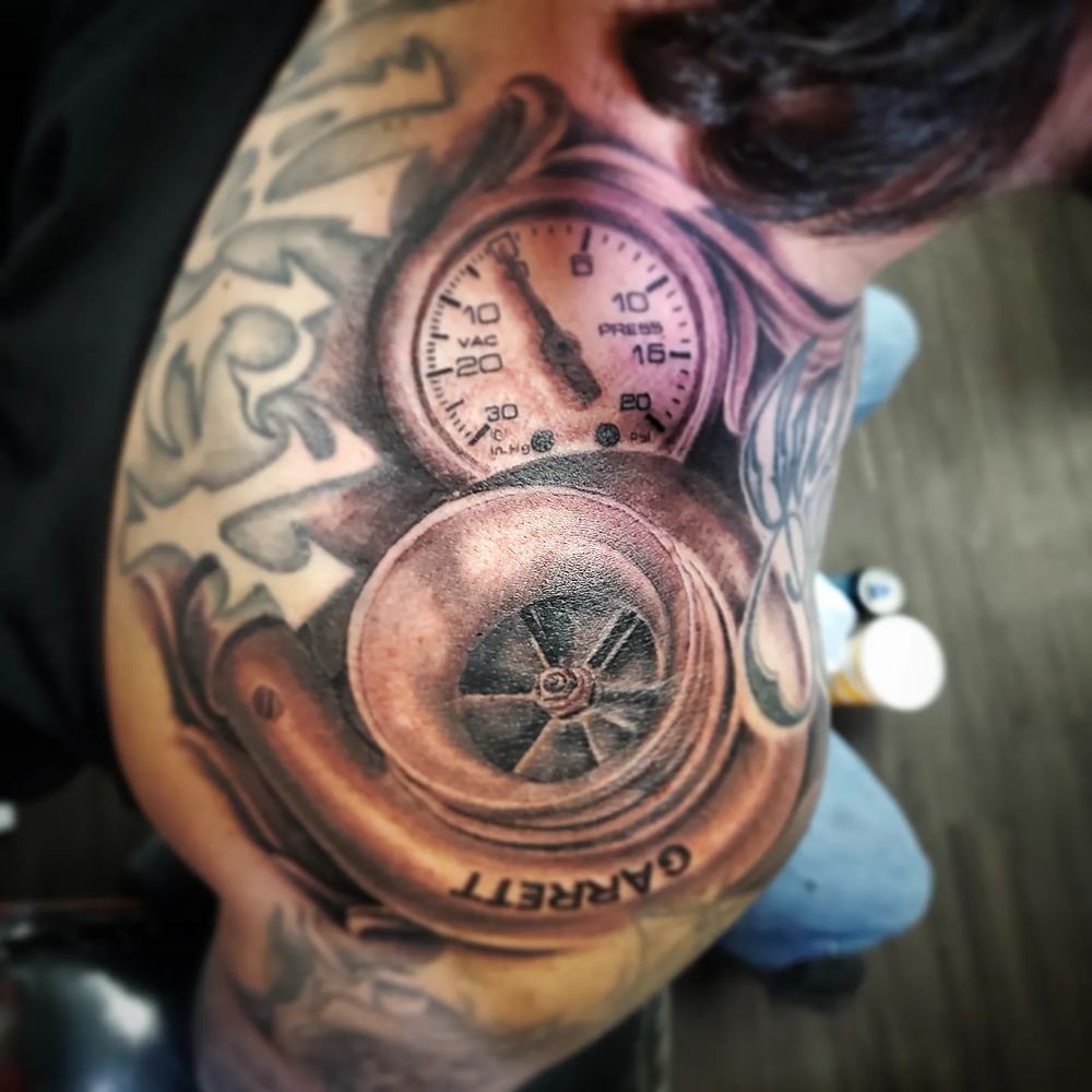 Clock & camera tattoo by Adrian Castro