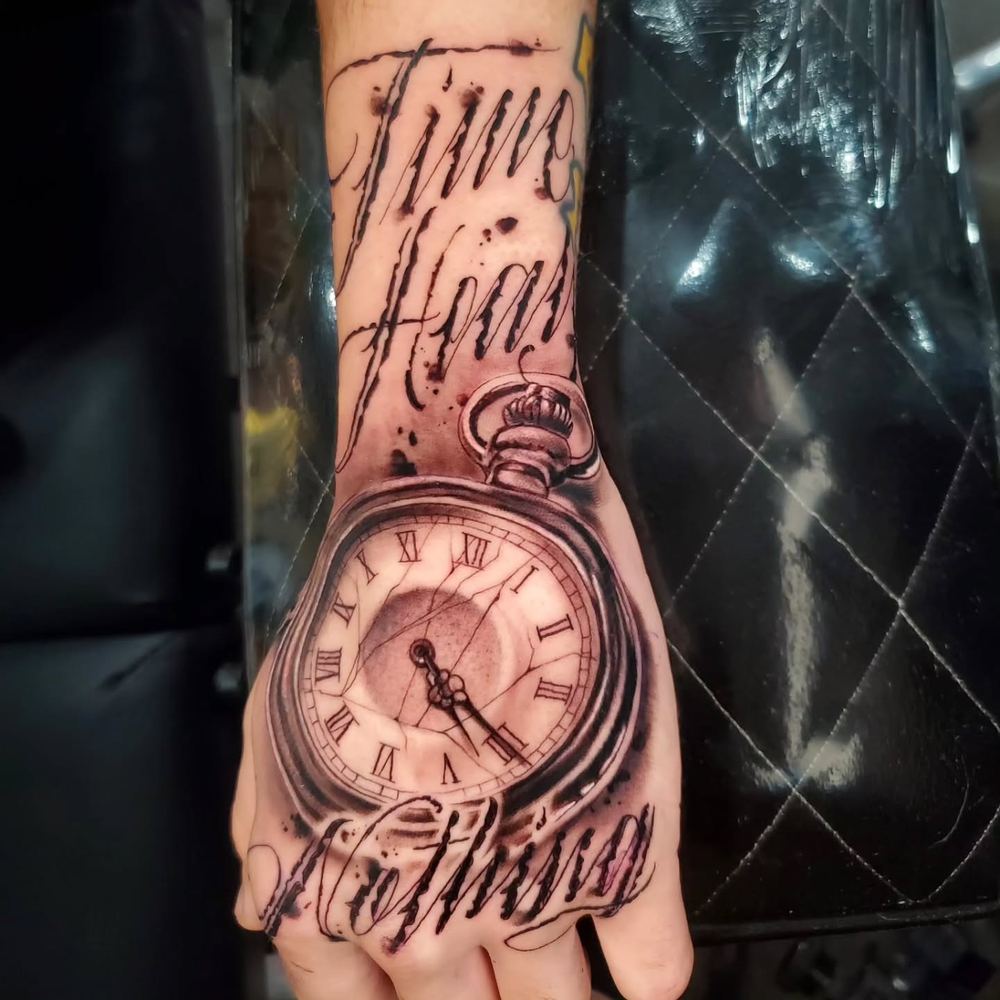 Clock & lettering tattoo by Adrian Castro