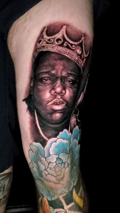 Portrait & flowers tattoo by Adrian Castro