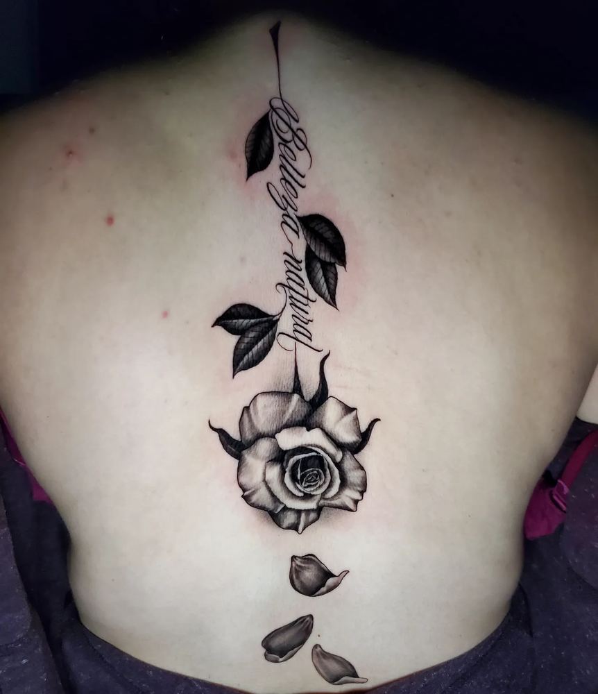 Rose & arrow tattoo by Adrian Castro