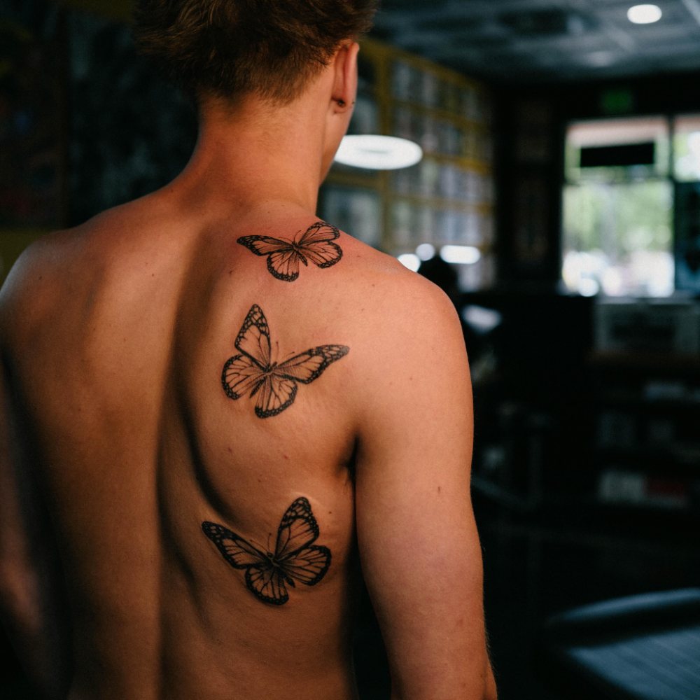 Butterflies tattoo by Ash Barroga
