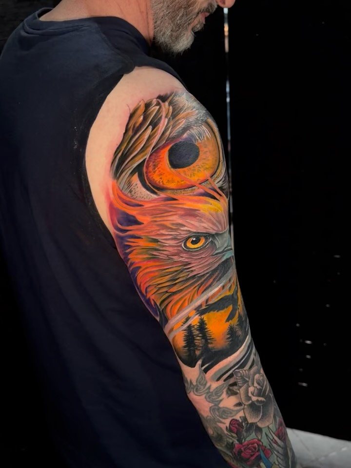 Phoenix and flames tattoo by Chase