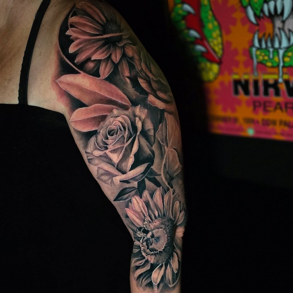 Flowers tattoo by Chase