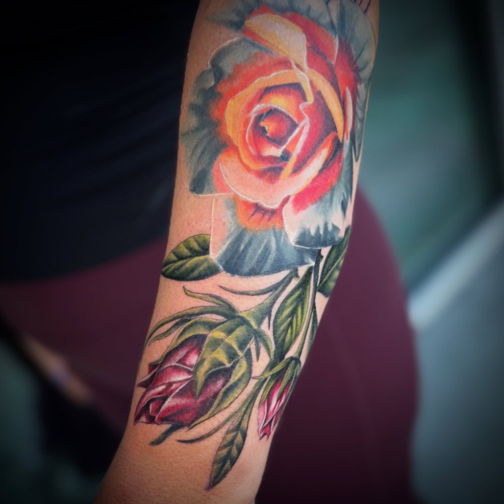 Rose tattoo by Chase