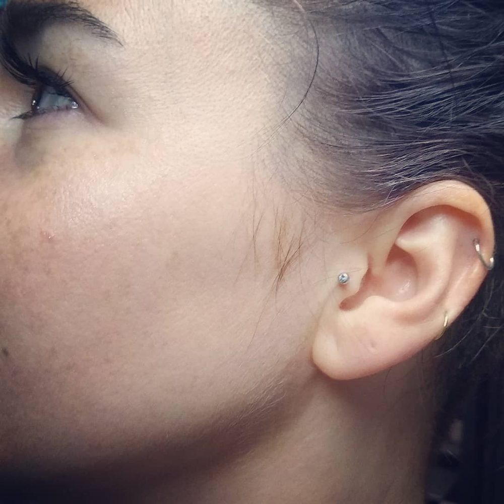 Tragus & cartilage by Doni