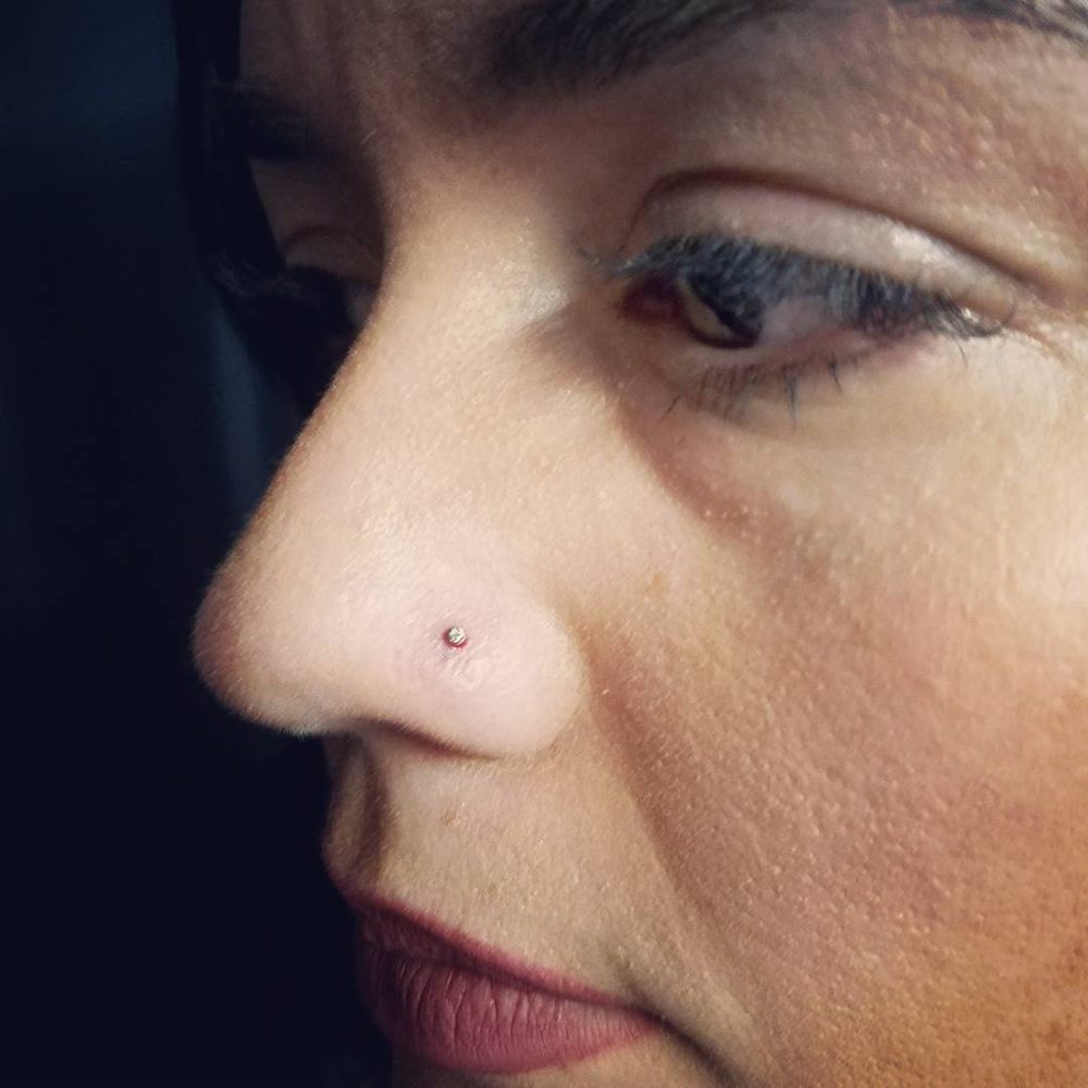 Nostril piercing by Doni