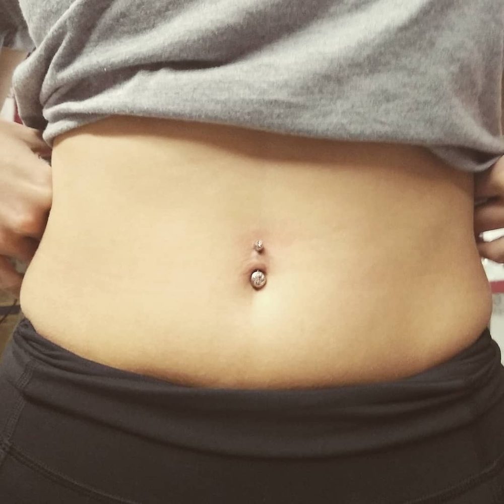 Navel piercing by Doni