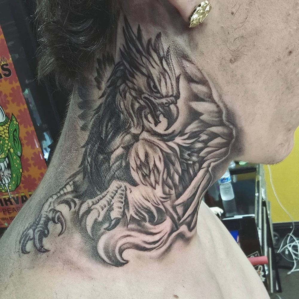 Tiger head tattoo by Jason Lawson
