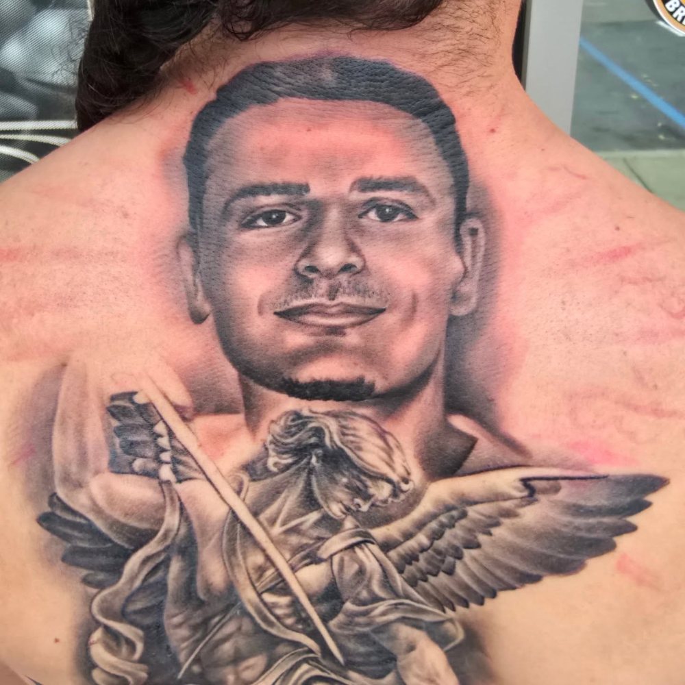 Memorial portrait & angel tattoo by Jason Lawson