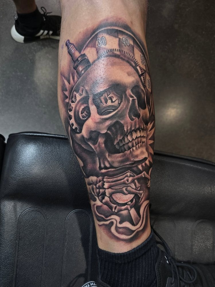 Ornamental skull tattoo by Jason Lawson