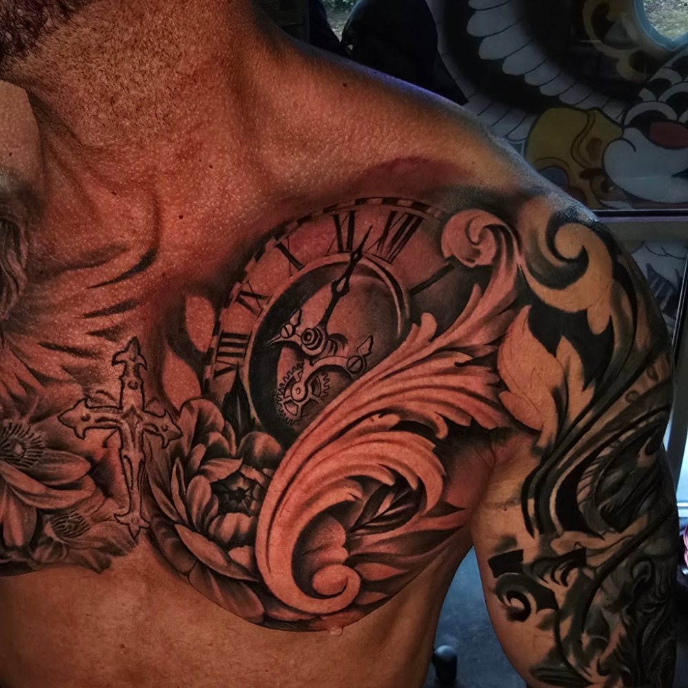 Skull, clock & flowers tattoo by Jason Lawson