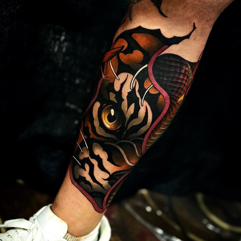 Flaming tiger tattoo by Marvin