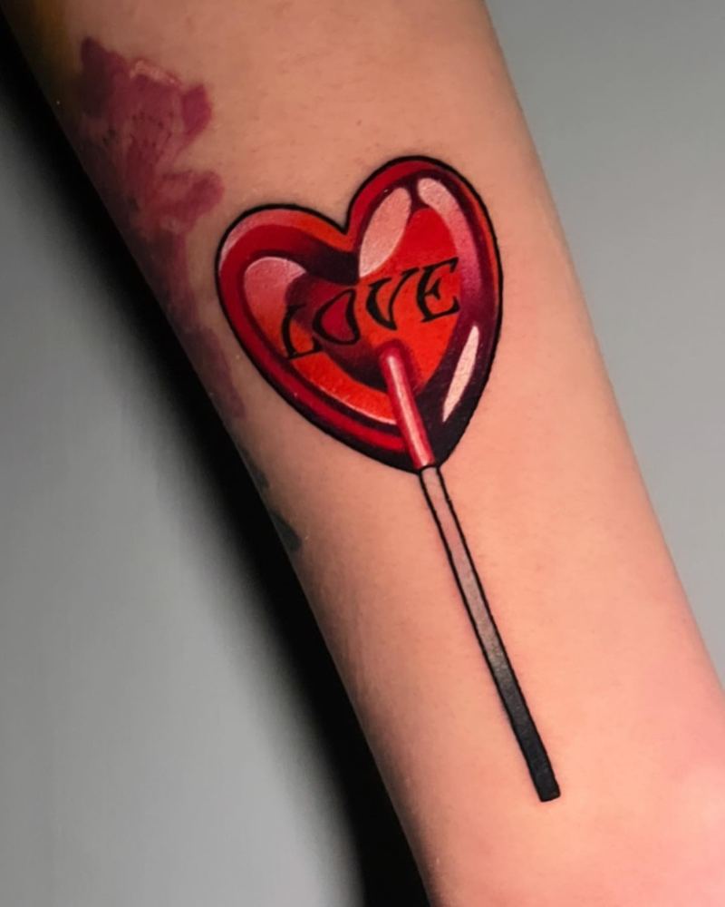 Heart lollipop tattoo by Sinai Alba